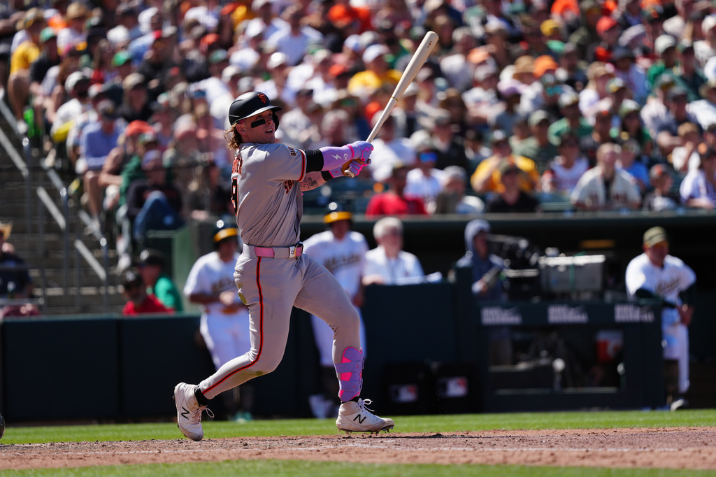 San Francisco Giants' Harrison Bader hits a grand slam in the eighth inning of a baseball game against the Athletics Sunday, May 17, 2026, in West Sacramento, Calif. (AP Photo/Alan Greth)