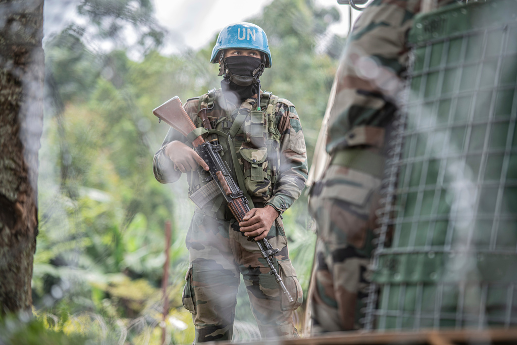 FILE - A MONUSCO blue helmet deployed near Kibumba, north of Goma, Democratic Republic of Congo, on Jan. 28, 2022. (AP Photo/Moses Sawasawa, File)