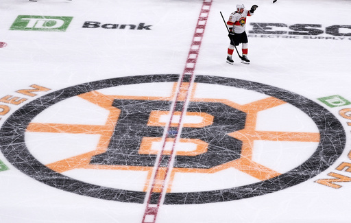 Florida Panthers left wing Brad Marchand (63), who played for more than 15 seasons with the Boston Bruins, acknowledges fans during a standing ovation during a break in the first period of an NHL hockey game, Tuesday, Oct. 21, 2025, in Boston. (AP Photo/Charles Krupa) Florida Panthers left wing Brad Marchand (63), who played for more than 15 seasons with the Boston Bruins, acknowledges fans during a standing ovation during a break in the first period of an NHL hockey game, Tuesday, Oct. 21, 2025, in Boston. (AP Photo/Charles Krupa)