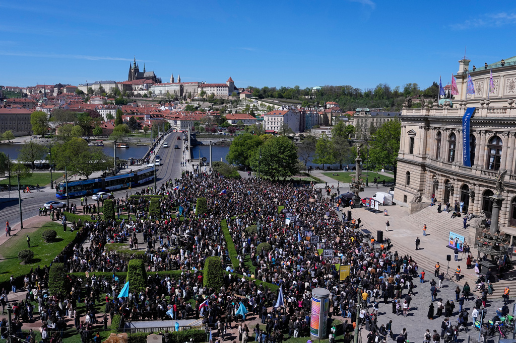 Thousands of students attend a demonstration in support of public media in Prague, Czech Republic, Wednesday, April 22, 2026. (AP Photo/Petr David Josek)