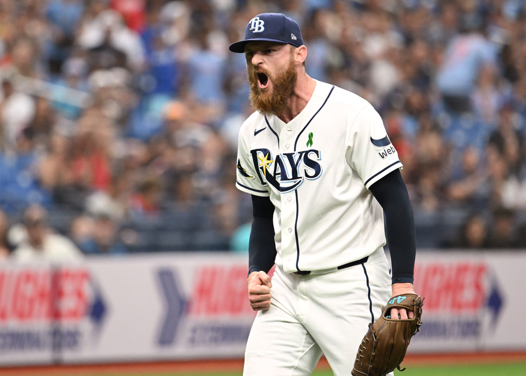 Tampa Bay Rays pitcher Bryan Baker reacts after getting the final out of the ninth inning during a baseball game against the San Francisco Giants, Sunday, May 3, 2026, in St. Petersburg, Fla. (AP Photo/Jason Behnken)
