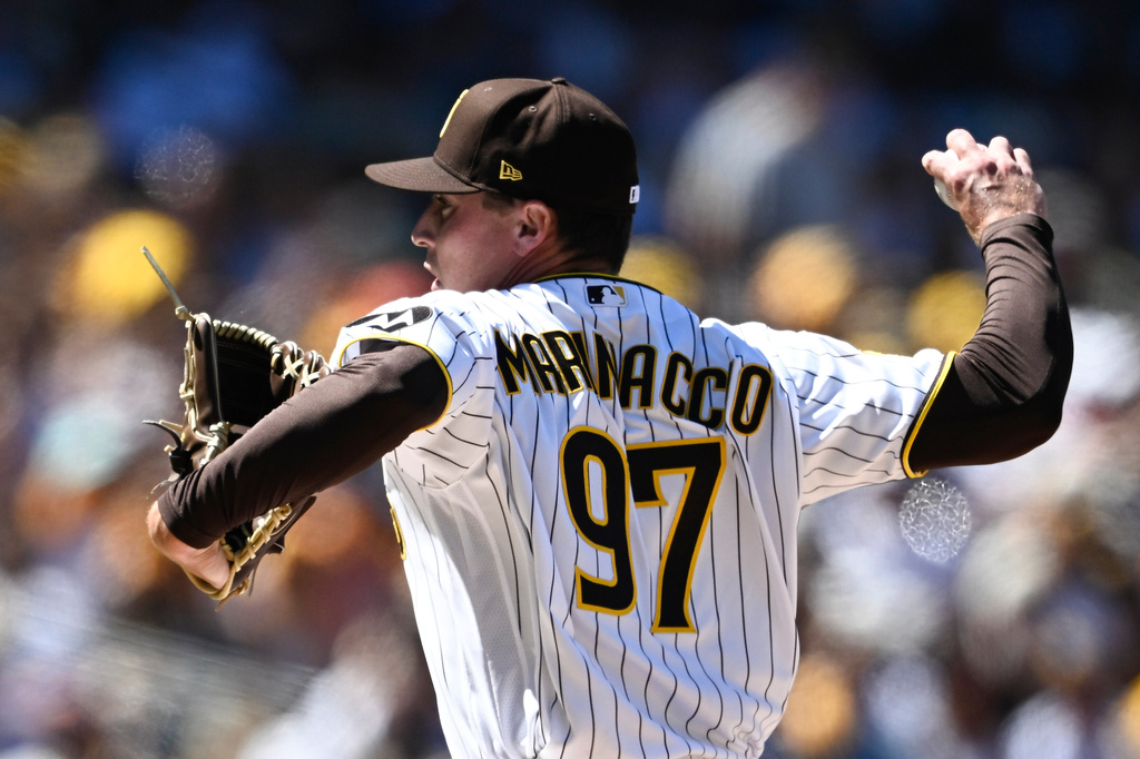 San Diego Padres pitcher Ron Marinaccio delivers during the fourth inning of an opening day baseball game against the Detroit Tigers, Thursday, March 26, 2026, in San Diego. (AP Photo/Denis Poroy)