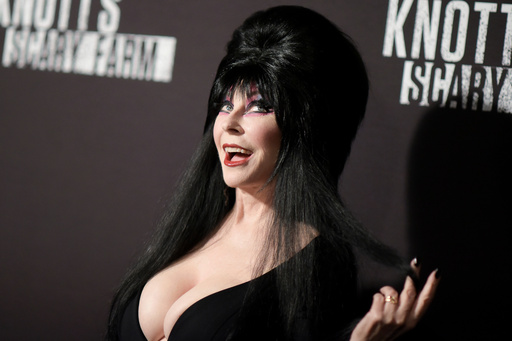 FILE - Cassandra Peterson appears at the 2016 Knott's Scary Farm Black Carpet Event at Knott's Berry Farm in Buena Park, Calif., on Sept. 30, 2016, (Photo by Richard Shotwell/Invision/AP, File) FILE - Cassandra Peterson appears at the 2016 Knott's Scary Farm Black Carpet Event at Knott's Berry Farm in Buena Park, Calif., on Sept. 30, 2016, (Photo by Richard Shotwell/Invision/AP, File)