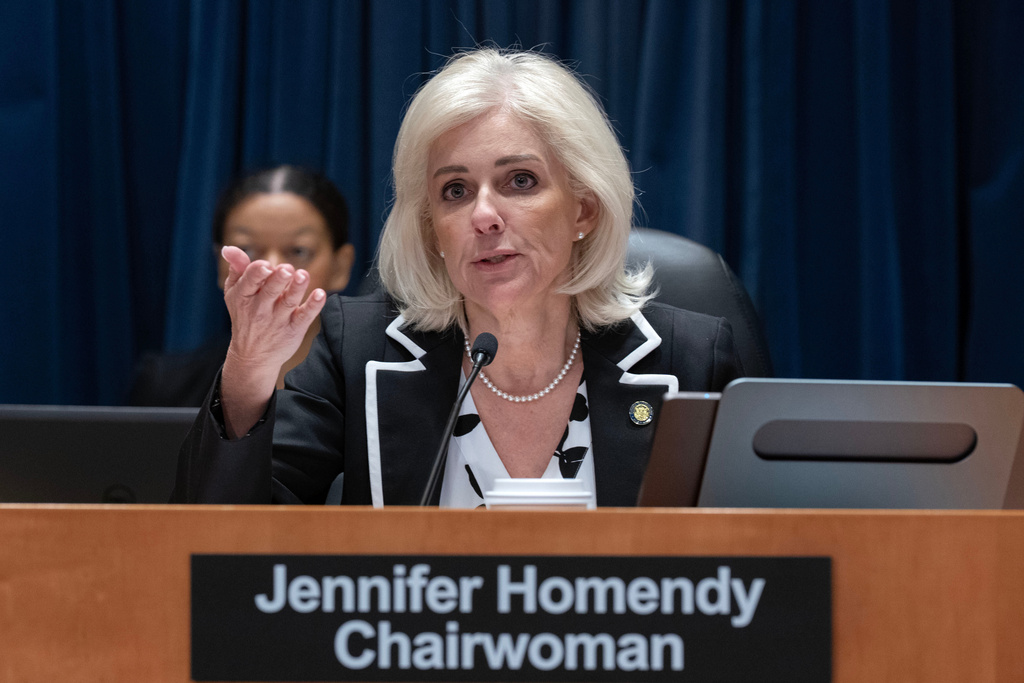 National Transportation Safety Board (NTSB) Chairwoman Jennifer Homendy presides over a NTSB hearing on the midair aircraft collision that killed 67 people near Washington Reagan National Airport, in Washington, Tuesday, Jan. 27, 2026. (AP Photo/Jose Luis Magana)