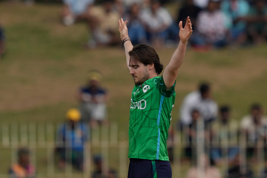 Ireland's Josh Little celebrates the wicket of Oman's Mohammad Nadeem during the T20 World Cup cricket match between Ireland and Oman in Colombo, Sri Lanka, Saturday, Feb. 14, 2026. (AP Photo/Eranga Jayawardena)