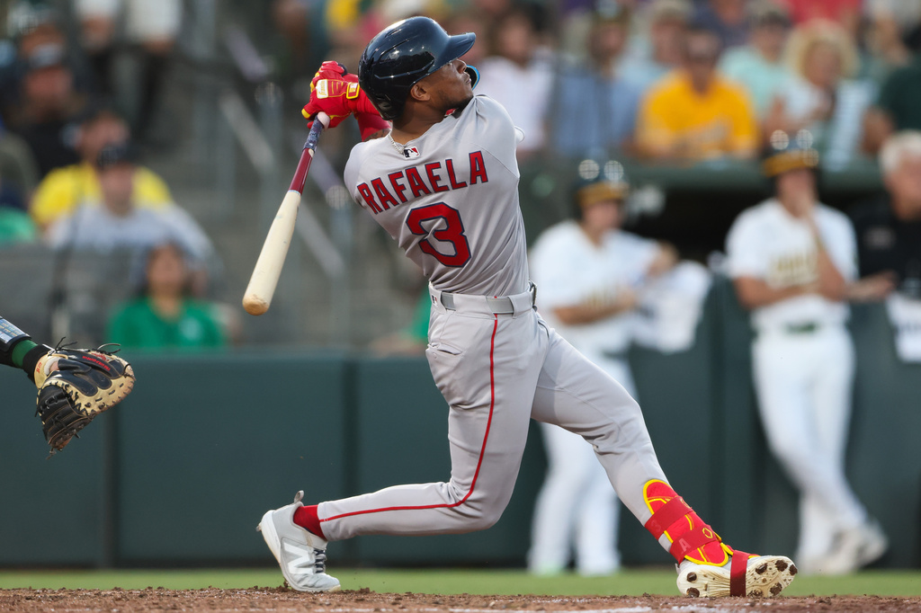 Boston Red Sox's Ceddanne Rafaela watches his grand slam during the sixth inning of a baseball game against the Athletics, Monday, July 27, 2026, in West Sacramento, Calif. (AP Photo/Scott Marshall)