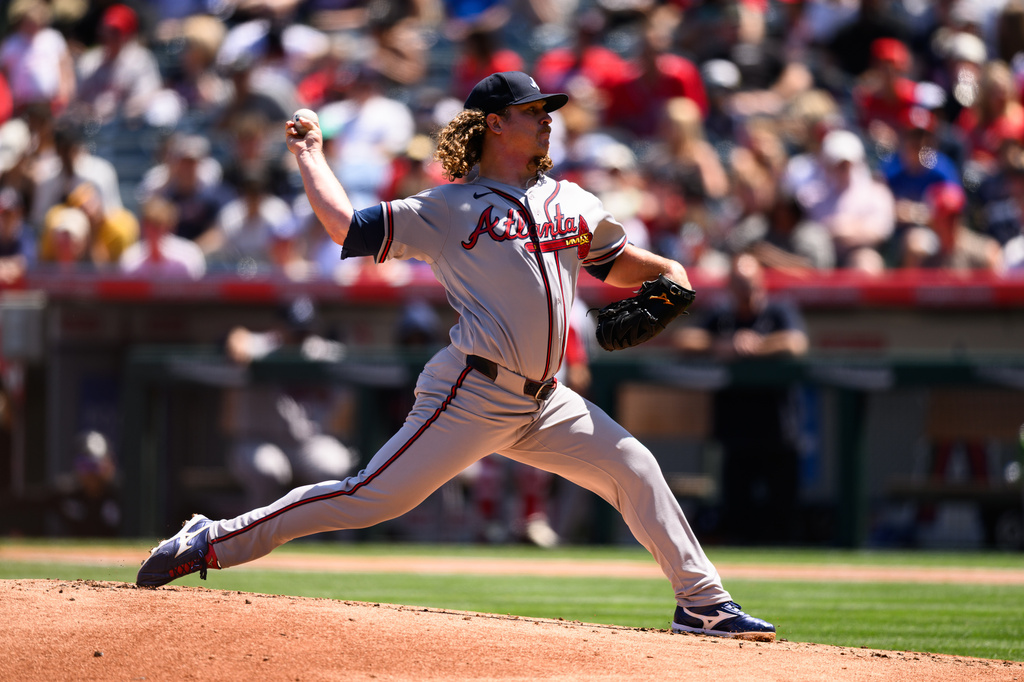 Atlanta Braves pitcher Grant Holmes delivers during the first inning of a baseball game against the Los Angeles Angels, Wednesday, April 8, 2026, in Anaheim, Calif. (AP Photo/William Liang)
