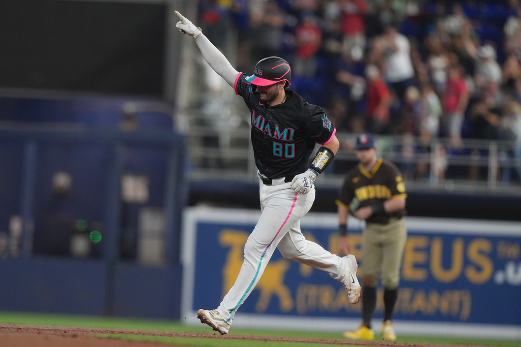 Miami Marlins' Joe Mack (80) gestures after hitting a home run during the second inning of a baseball game against the San Diego Padres Friday, July 24, 2026, in Miami. (AP Photo/Marta Lavandier)