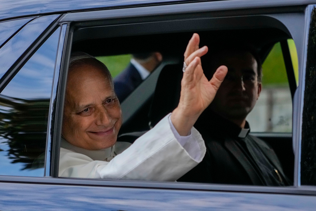 Pope Leo XIV leaves Rome's Agostino Gemelli Polyclinic on Saturday, Oct. 17, 2026, after Tuesday's surgery to remove lung cancer. (AP Photo/Gregorio Borgia)