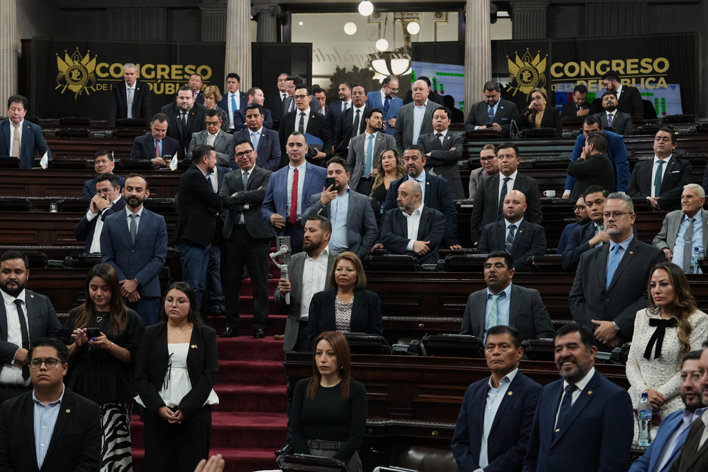 Lawmakers debate whether to ratify the state of emergency decreed by President Bernardo Arévalo following an escalation of gang-related violence, in Guatemala City, Monday, Jan. 19, 2026. (AP Photo/Moises Castillo)