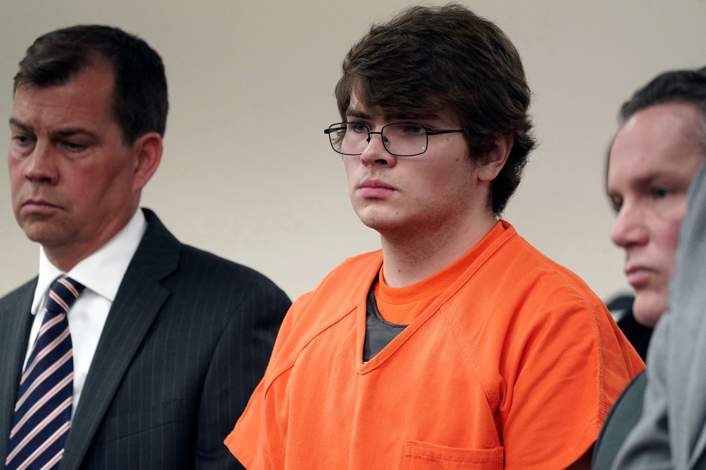 FILE - Payton Gendron, center, listens as he is sentenced, Feb 15, 2023, in Buffalo, N.Y. (Derek Gee/The Buffalo News via AP, Pool, File)