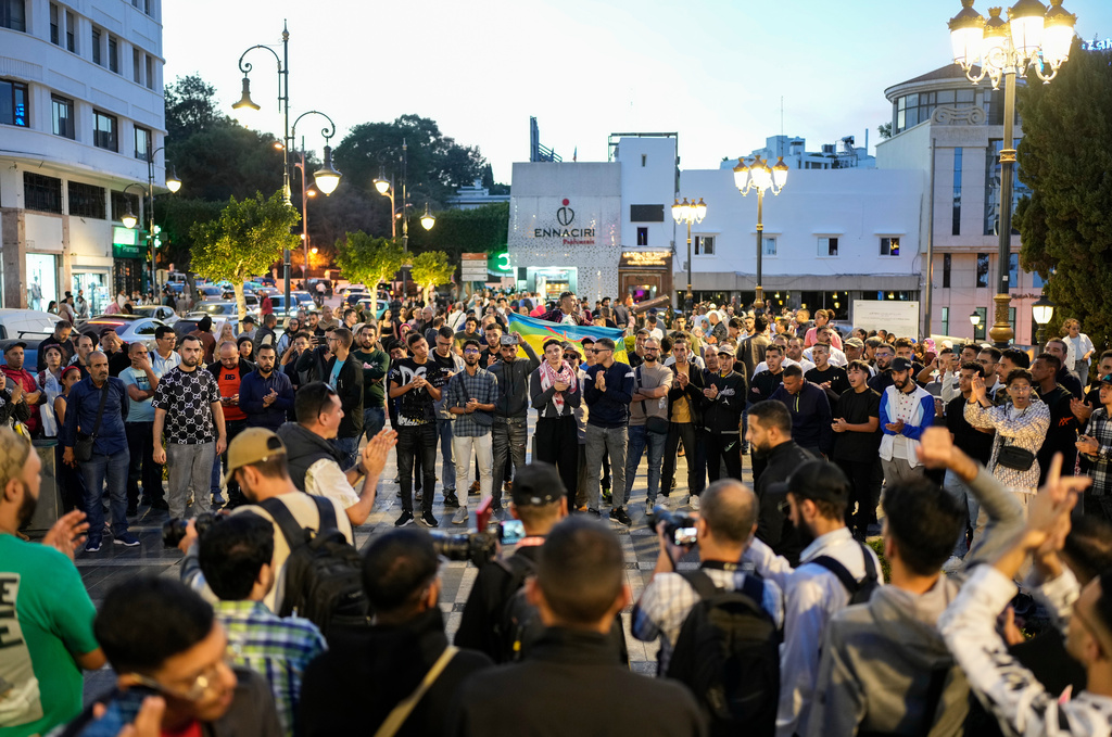 People take part in a youth led protest calling for education and healthcare reforms, in Tangier, Morocco, Saturday, Oct. 18, 2025. (AP Photo/Mosa'ab Elshamy)