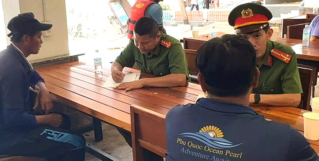 Investigators with crew members involved in the speedboat incident in Phu Quoc, Vietnam, Sunday, July 12, 2026. (VNA/Tran Van Si)