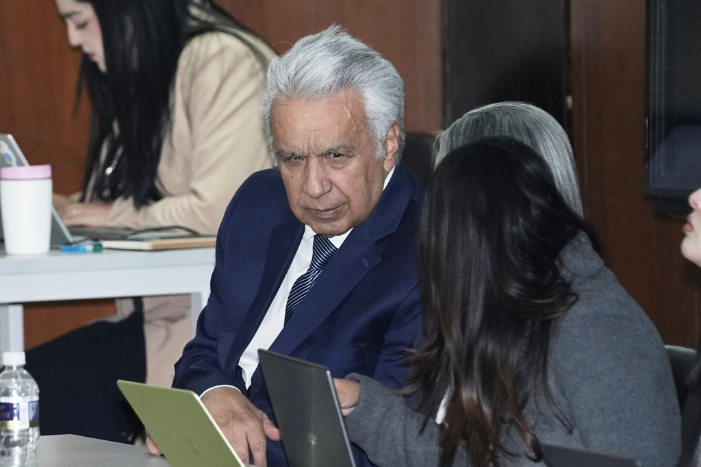 Ecuador's former President Lenin Moreno, who is charged with accepting bribes from Chinese company Sinohydro in connection with the construction of one of the country's hydroelectric power plants, attends a hearing at the National Court of Justice in Quito, Ecuador, Friday, Aug. 28, 2026. (AP Photo/Dolores Ochoa)