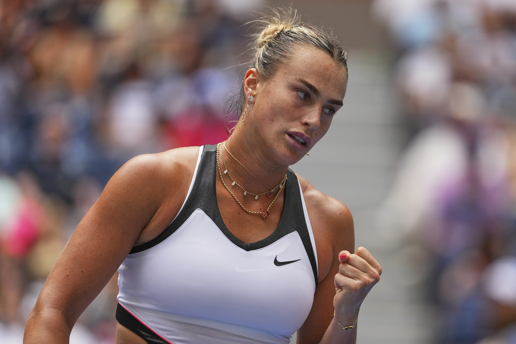 Aryna Sabalenka, of Belarus, reacts after scoring a point against Rebeka Masarova, of Switzerland, during the first round of the US Open tennis championships, Sunday, Aug. 24, 2025, in New York. (AP Photo/Kirsty Wigglesworth)