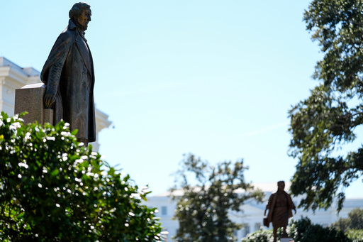 A statue of president of the Confederate States Jefferson Davis, left, and the newly unveiled statue of Rosa Parks are seen on the grounds of the Alabama State Capitol, Friday, Oct. 24, 2025, in Montgomery, Ala. (AP Photo/Mike Stewart) A statue of president of the Confederate States Jefferson Davis, left, and the newly unveiled statue of Rosa Parks are seen on the grounds of the Alabama State Capitol, Friday, Oct. 24, 2025, in Montgomery, Ala. (AP Photo/Mike Stewart)