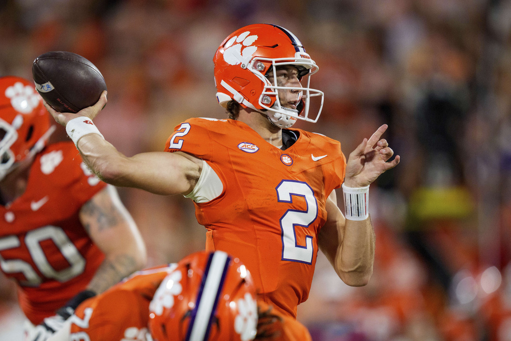 Clemson quarterback Cade Klubnik (2) passes the ball in the first half of an NCAA college football game against LSU, Saturday, Aug. 30, 2025, in Clemson, S.C. (AP Photo/Jacob Kupferman)