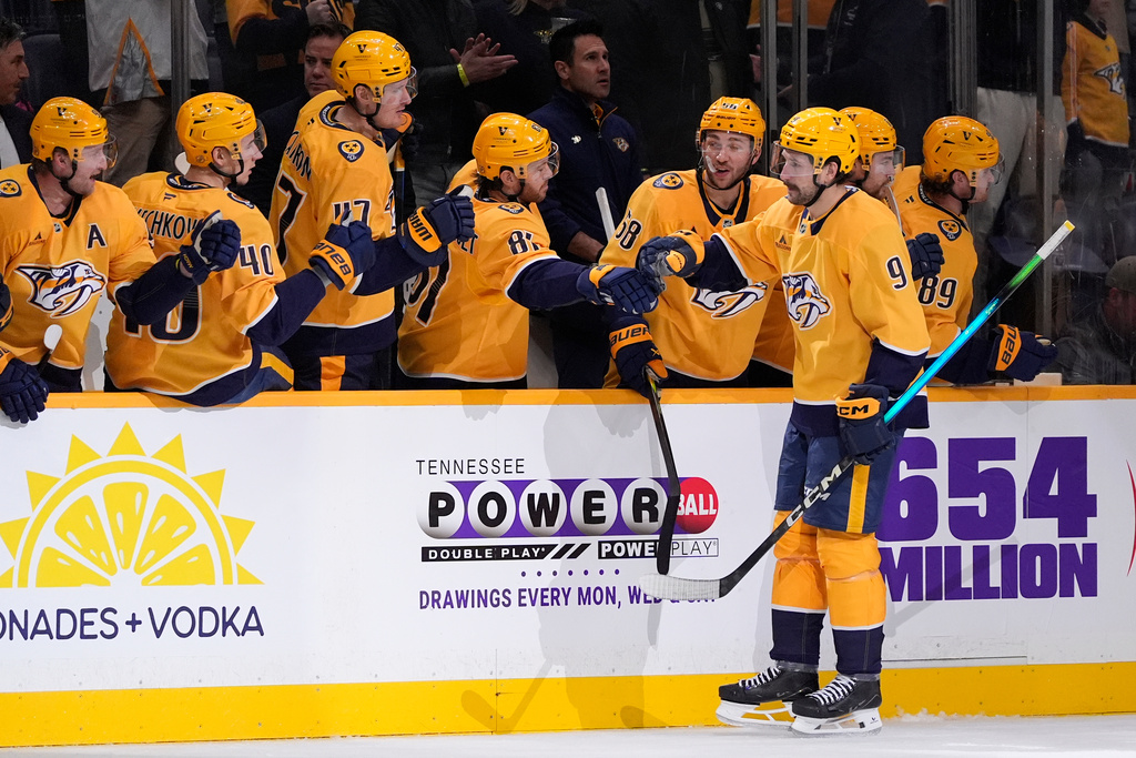 Nashville Predators left wing Filip Forsberg (9) celebrates his goal during the first period of an NHL hockey game against the Florida Panthers, Monday, Nov. 24, 2025, in Nashville, Tenn. (AP Photo/George Walker IV)
