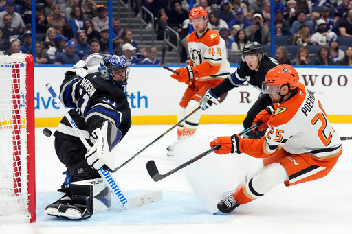Anaheim Ducks center Ryan Poehling (25) scores past Tampa Bay Lightning goaltender Jonas Johansson (31) during the third period of an NHL hockey game Saturday, Oct. 25, 2025, in Tampa, Fla. (AP Photo/Chris O'Meara) Anaheim Ducks center Ryan Poehling (25) scores past Tampa Bay Lightning goaltender Jonas Johansson (31) during the third period of an NHL hockey game Saturday, Oct. 25, 2025, in Tampa, Fla. (AP Photo/Chris O'Meara)