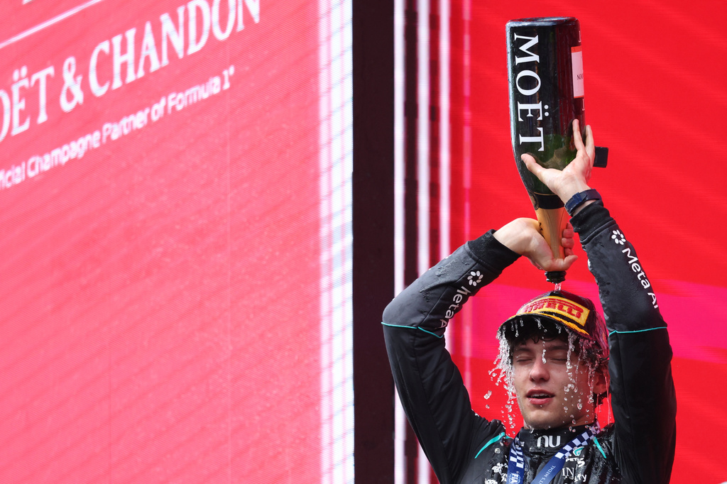 Mercedes driver Andrea Kimi Antonelli of Italy celebrates on the podium after winning the Formula One Grand Prix at the Spa-Francorchamps racetrack in Spa, Belgium, Sunday, July 19, 2026. (AP Photo/Omar Havana)