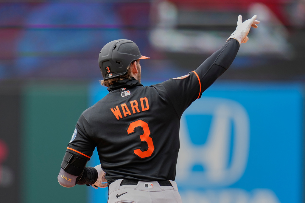 Baltimore Orioles' Taylor Ward (8) gestures as he runs the bases with a home run in the fifth inning of a baseball game against the Cleveland Guardians in Cleveland, Sunday, April 19, 2026. (AP Photo/Sue Ogrocki)