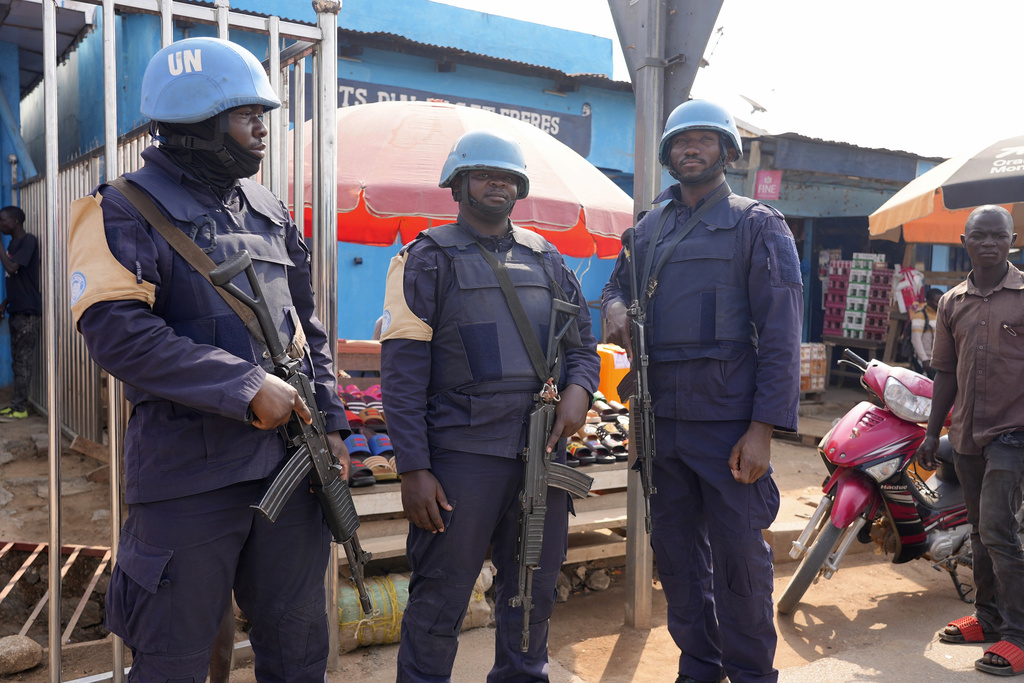 FILE - United Nations peacekeepers stand in the market in Bouar, Central African Republic, March 8, 2024. (AP Photo/Sam Mednick, File)
