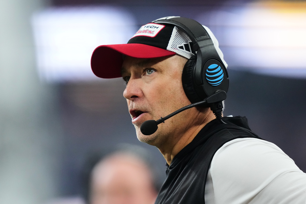 Texas Tech head coach Joey McGuire watches play in the second half of a Big 12 Conference championship NCAA college football game against BYU Saturday, Dec. 6, 2025, in Arlington, Texas. (AP Photo/Julio Cortez)