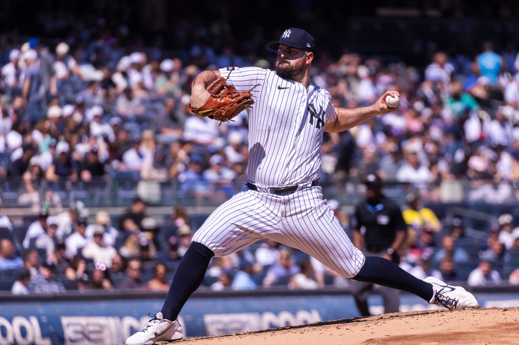 New York Yankees pitcher Carlos Rodón (55) throws in the third inning during the first baseball game of a doubleheader against the Boston Red Sox, Saturday, Aug. 29, 2026, in New York. (AP Photo/Corey Sipkin)