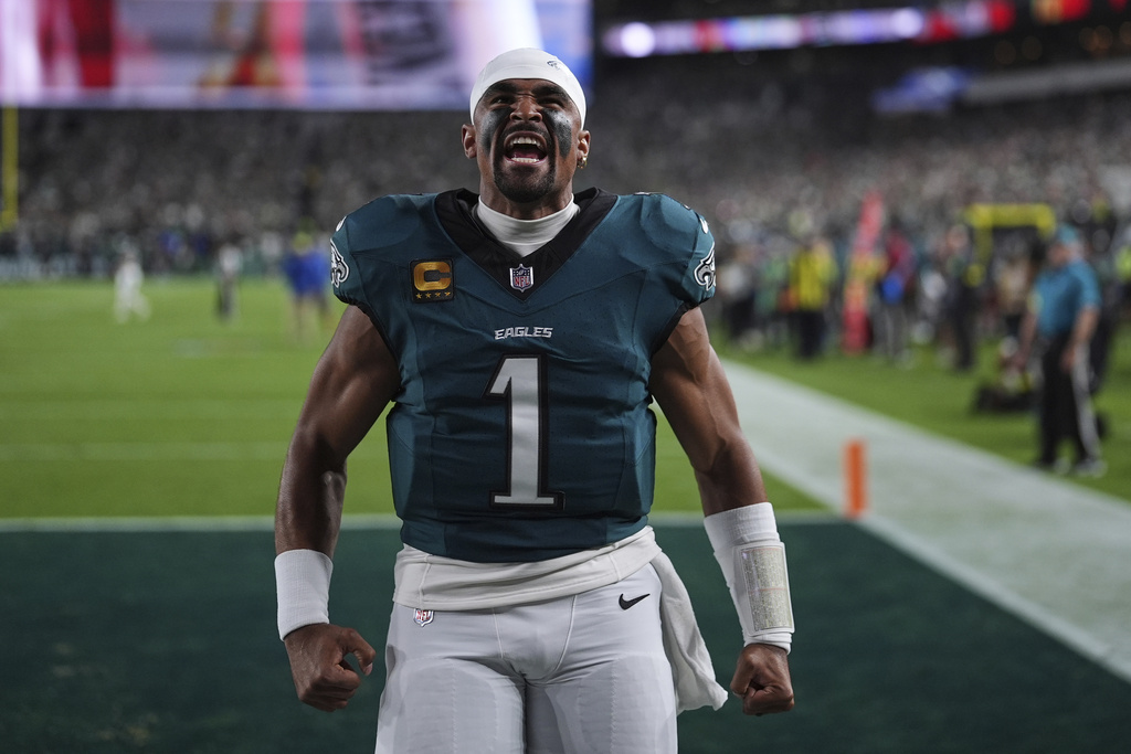 Philadelphia Eagles' Jalen Hurts motivates fans before an NFL football game against the Dallas Cowboys Thursday, Sept. 4, 2025, in Philadelphia. (AP Photo/Matt Slocum)