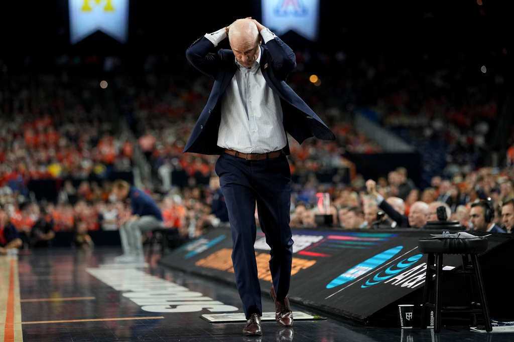 UConn head coach Dan Hurley reacts after a call during the second half of an NCAA college basketball tournament semifinal game against Illinois at the Final Four, Saturday, April 4, 2026, in Indianapolis. (AP Photo/Abbie Parr)