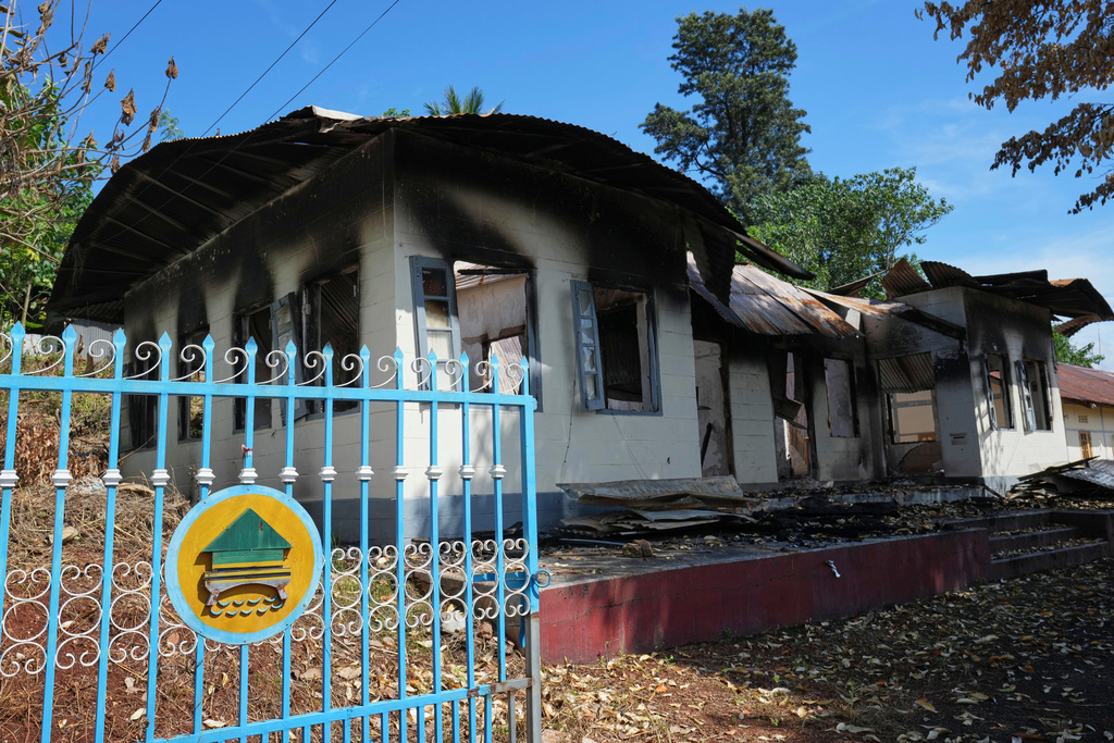 In this photo taken during a trip supervised by pro-military Myanmar media, a damaged government residence is seen in Kyaukme, northern Shan State, Myanmar, Friday, Oct. 10, 2025. (AP Photo/Aung Shine Oo)