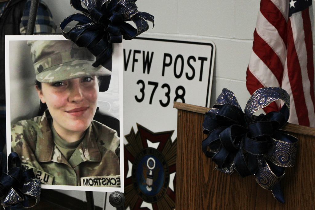 A photo of National Guard member Specialist Sarah Beckstrom is displayed at a vigil held in her honor in Webster Springs, W.Va., Friday, Nov. 28, 2025. (Rachel Isabell/The Daily Times via AP)