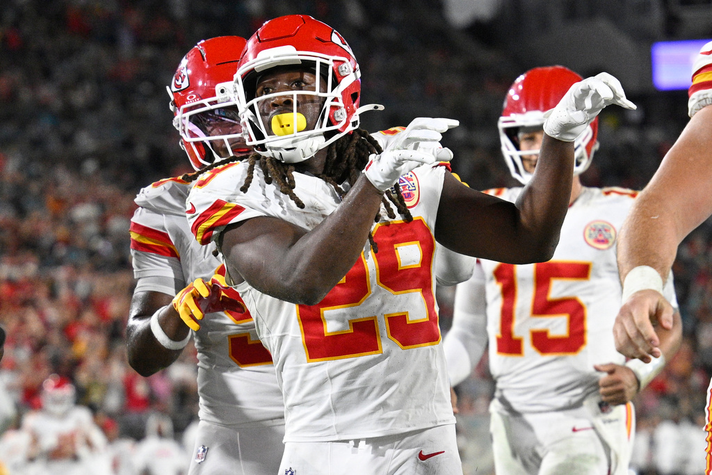 Kansas City Chiefs running back Kareem Hunt (29) celebrates after scoring a touchdown during the second half of an NFL football game against the Jacksonville Jaguars, Monday, Oct. 6, 2025, in Jacksonville, Fla. (AP Photo/Phelan M. Ebenhack)