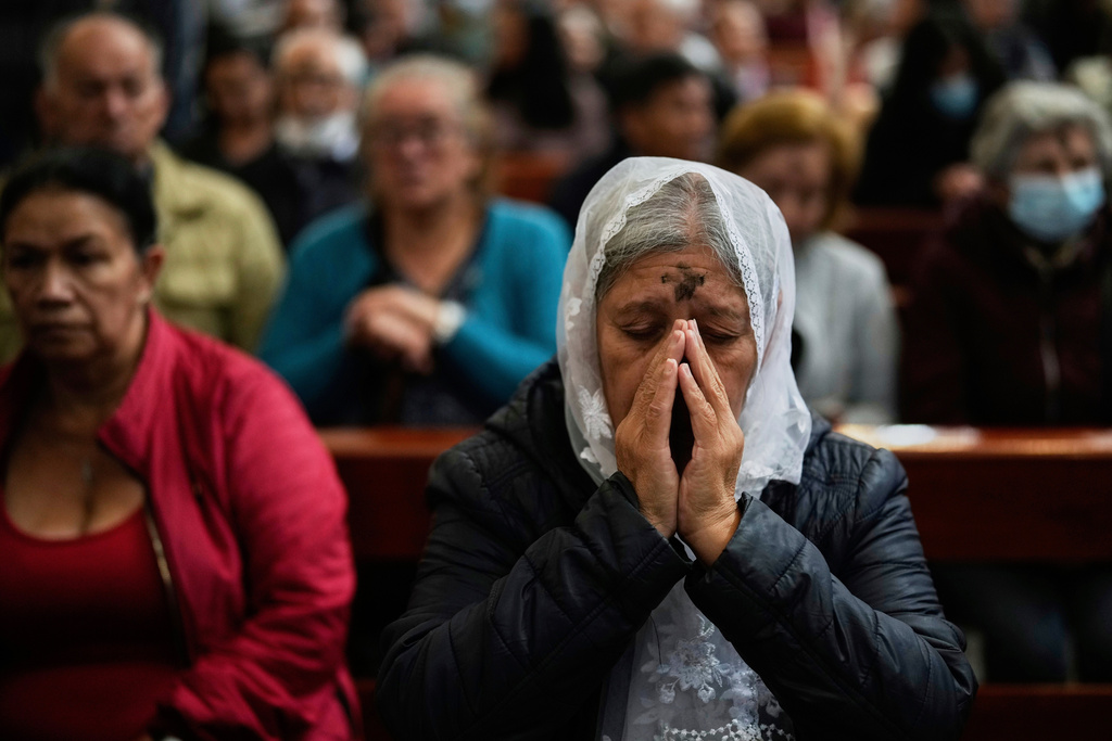 FILE - Catholics attend Ash Wednesday Mass in Bogota, Colombia, March 5, 2025. (AP Photo/Fernando Vergara, File)