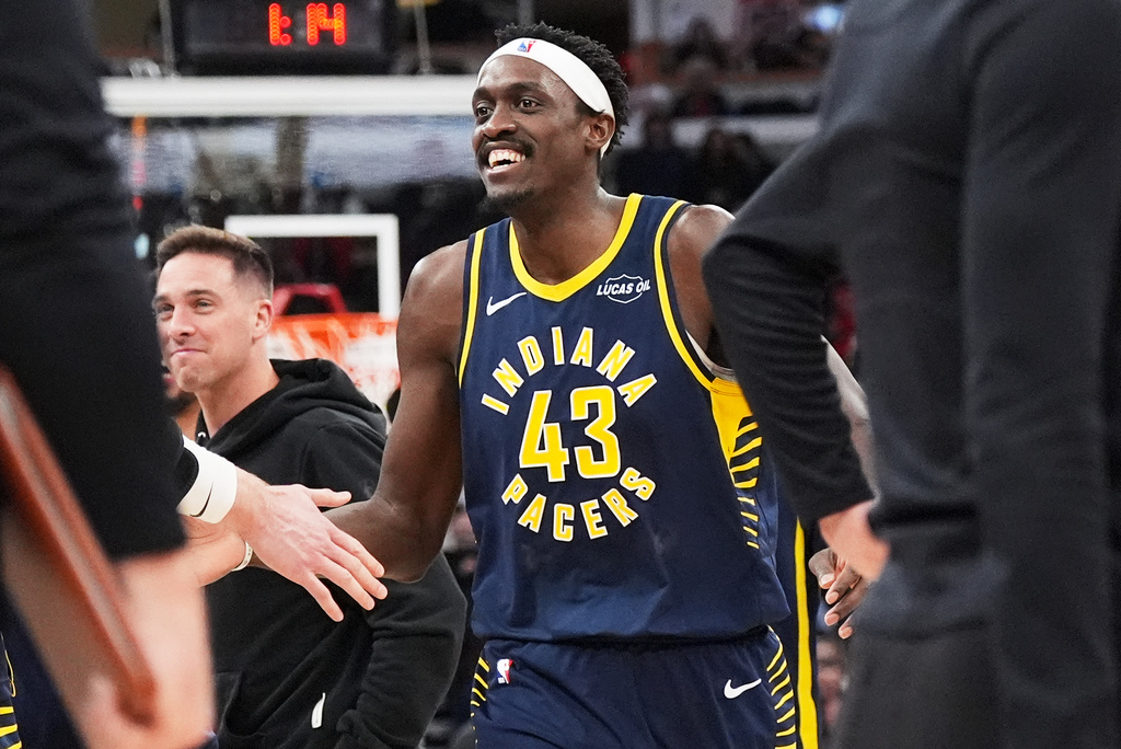Indiana Pacers forward Pascal Siakam celebrates with teammates after scoring a basket during the first half of an NBA basketball game against the Chicago Bulls in Chicago, Wednesday, April 1, 2026. (AP Photo/Nam Y. Huh)