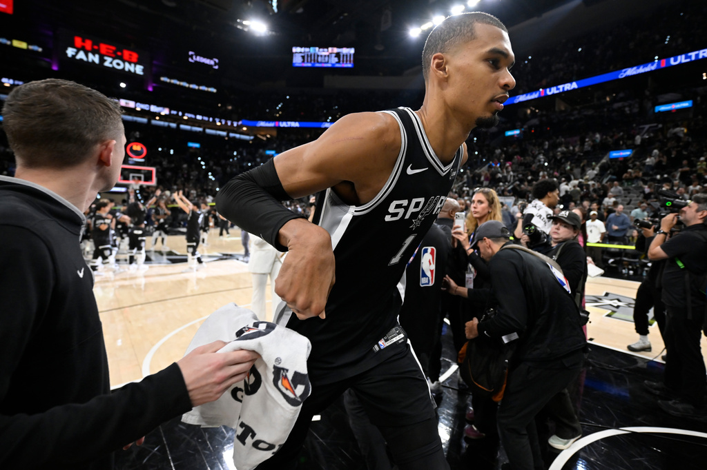 San Antonio Spurs forward Victor Wembanyama (1) leaves the court after the second half of Game 6 in the Western Conference finals NBA basketball playoffs series, Thursday, May 28, 2026, in San Antonio. (AP Photo/Darren Abate)