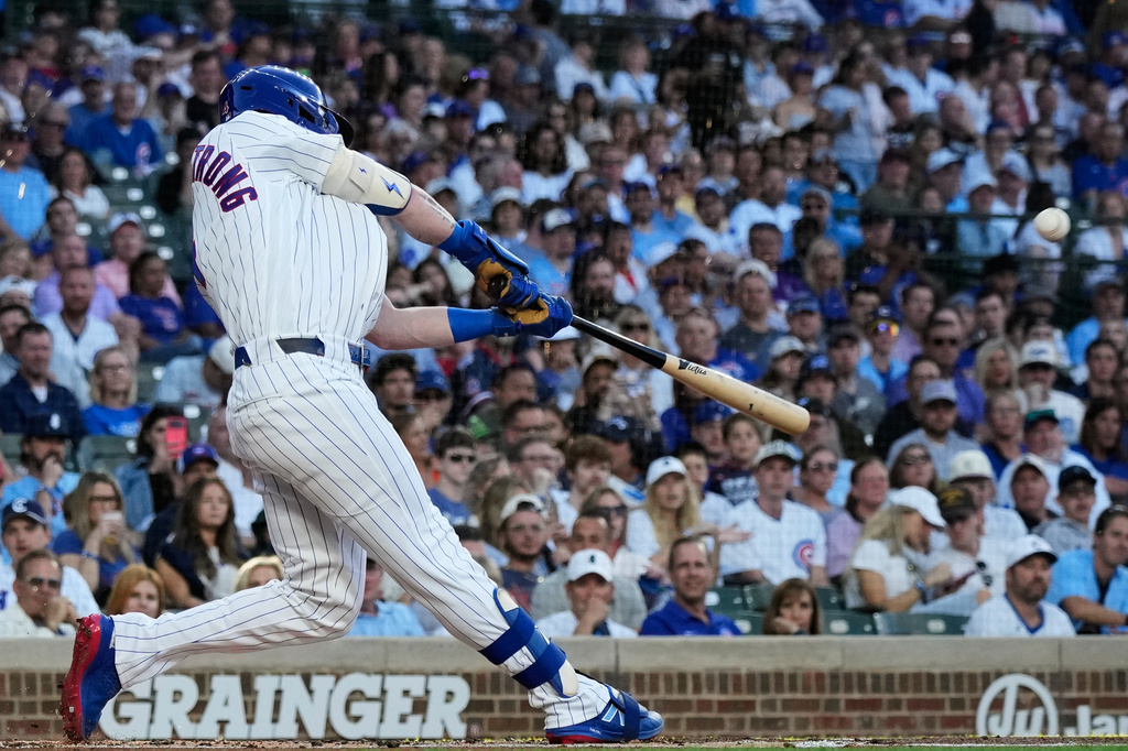 Chicago Cubs' Pete Crow-Armstrong hits a solo home run during the first inning of a baseball game against the Colorado Rockies in Chicago, Monday, June 15, 2026. (AP Photo/Nam Y. Huh)