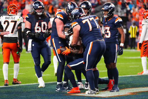 Denver Broncos wide receiver Courtland Sutton (14) celebrates with teammates after scoring a touchdown against the Cincinnati Bengals during the first half of an NFL football game Monday, Sept. 29, 2025, in Denver. (AP Photo/Jack Dempsey) Denver Broncos wide receiver Courtland Sutton (14) celebrates with teammates after scoring a touchdown against the Cincinnati Bengals during the first half of an NFL football game Monday, Sept. 29, 2025, in Denver. (AP Photo/Jack Dempsey)