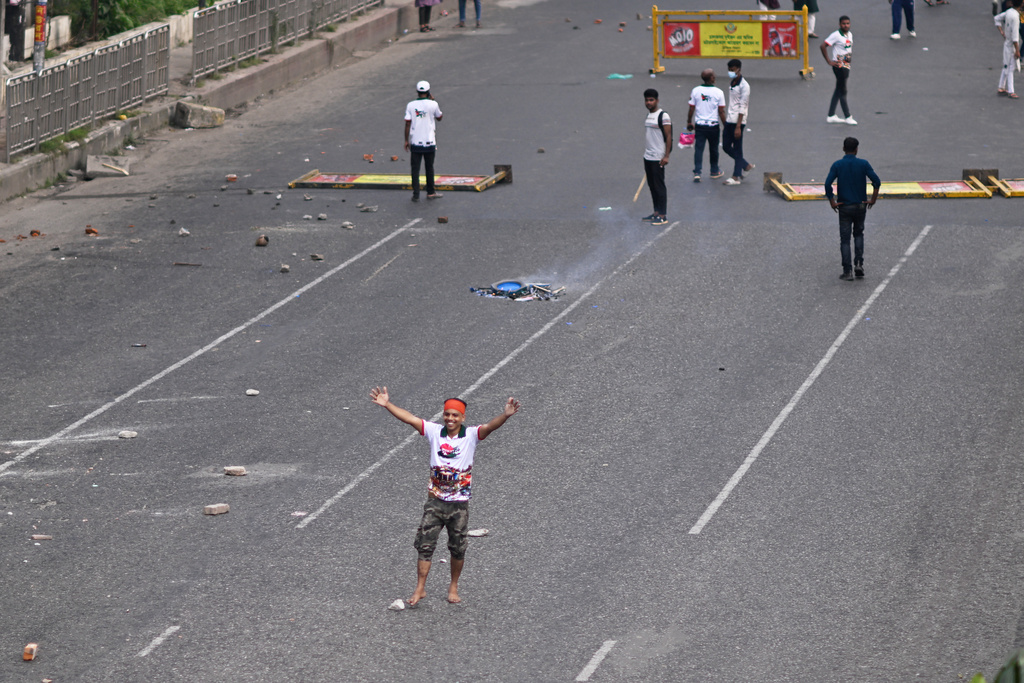 A protester shouts slogans outside Bangladesh's national parliament complex in Dhaka, Bangladesh, Friday, Oct. 17, 2025. (AP Photo/Mahmud Hossain Opu)