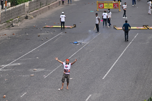 A protester shouts slogans outside Bangladesh's national parliament complex in Dhaka, Bangladesh, Friday, Oct. 17, 2025. (AP Photo/Mahmud Hossain Opu) A protester shouts slogans outside Bangladesh's national parliament complex in Dhaka, Bangladesh, Friday, Oct. 17, 2025. (AP Photo/Mahmud Hossain Opu)