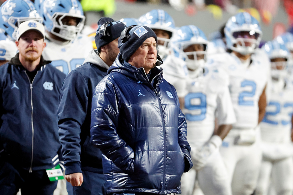 North Carolina head coach Bill Belichick watches from the sideline during the second half of an NCAA college football game against North Carolina State in Raleigh, N.C., Saturday, Nov. 29, 2025. (AP Photo/Karl DeBlaker)