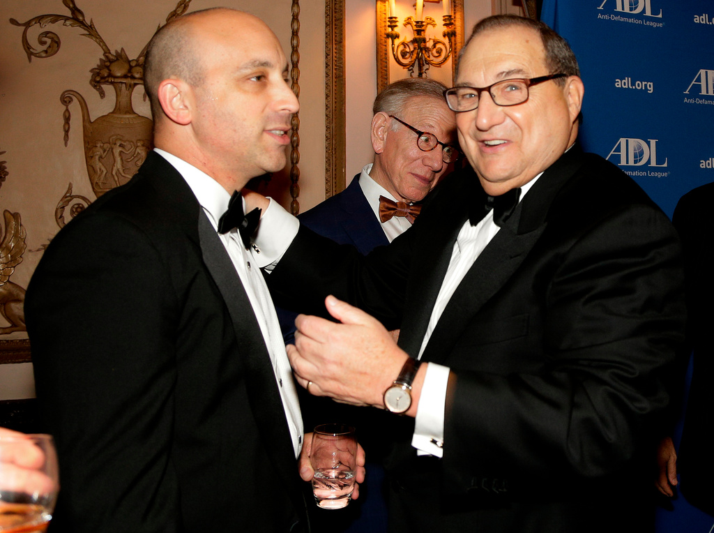 FILE - In this June 17, 2015 photo, Jonathan Greenblatt, left, incoming national director for the Anti-Defamation League, talks with Abe Foxman, current director of the ADL, during a reception for a special dinner in Foxman's honor in New York. AP Photo/Julie Jacobson, File)