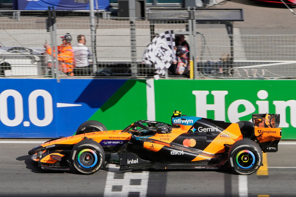 McLaren driver Lando Norris of Britain wins the Formula One Dutch Grand Prix in Zandvoort , Netherlands, Sunday, Aug. 23, 2026. (AP Photo/Darko Bandic)