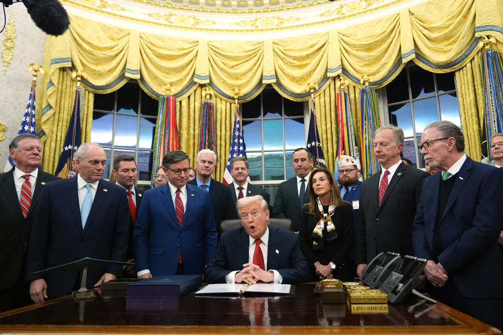 President Donald Trump speaks before signing the funding bill to reopen the government, in the Oval Office of the White House, Wednesday, Nov. 12, 2025, in Washington. (AP Photo/Jacquelyn Martin)