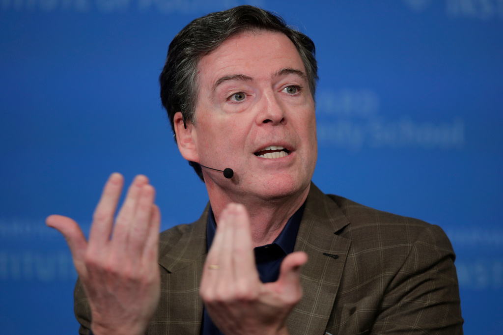 FILE - Former Director of the Federal Bureau of Investigation James Comey at Harvard University's Institute of Politics' JFK Jr. Forum in Cambridge, Mass., Feb. 24, 2020. (AP Photo/Charles Krupa, File)