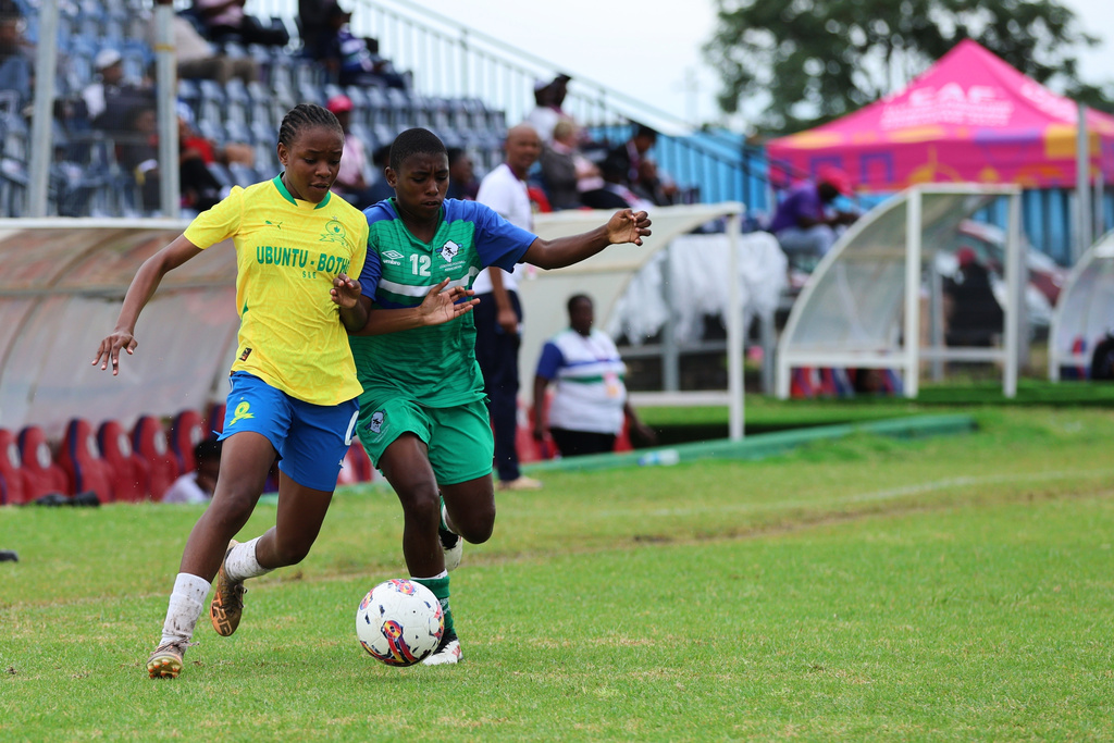 Girls participate in an U-17 tournament promoted by Africa's governing body to promote cervical cancer vaccination in Norton, Zimbabwe, Thursday, Dec. 18, 2025. (AP Photo/Aaron Ufumeli)