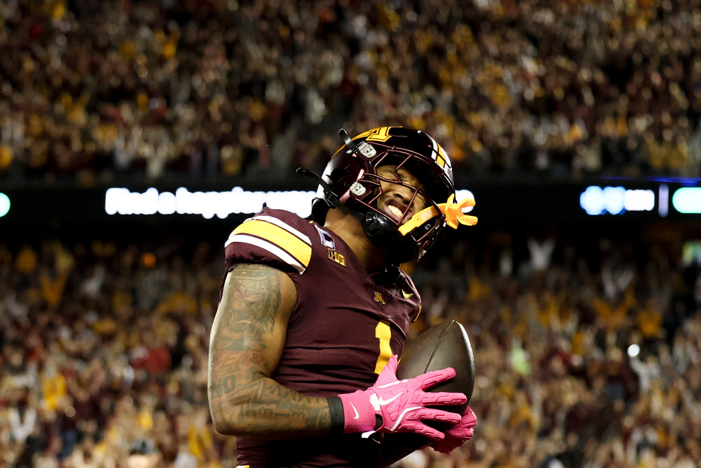 Minnesota running back Darius Taylor celebrates after making a gain during the first half of an NCAA college football game against Nebraska, Friday, Oct. 17, 2025, in Minneapolis. (AP Photo/Ellen Schmidt)
