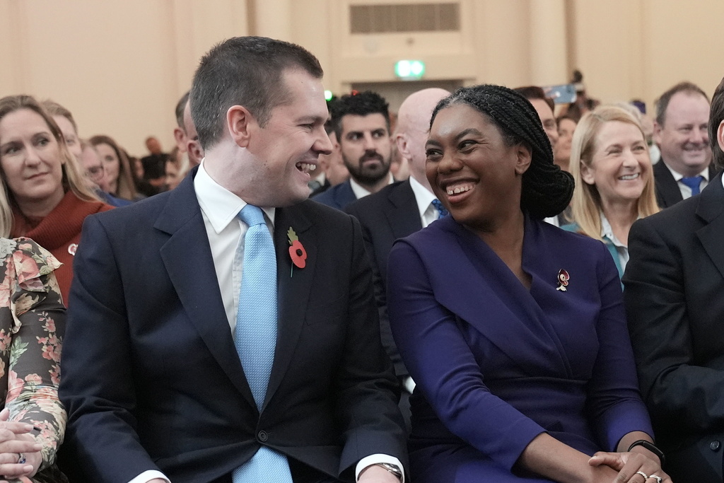 Kemi Badenoch with Robert Jenrick before being announced as the new Conservative Party leader following the vote by party members at 8 Northumberland Avenue in central London, Nov. 3, 2024. (Stefan Rousseau/PA via AP)