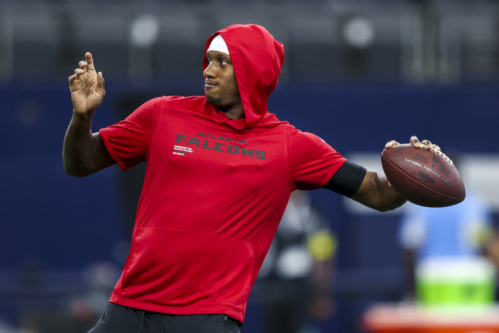 Atlanta Falcons quarterback Michael Penix Jr. works out prior to a preseason NFL football game against the Dallas Cowboys, Friday, Aug. 22, 2025, in Arlington, Texas. (AP Photo/Gareth Patterson)