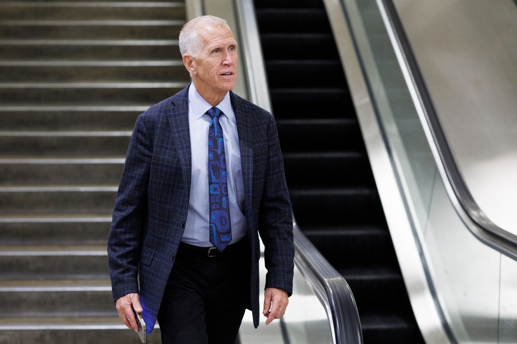 Sen. Thom Tillis, R-N.C., descends an stairwell after a vote at the Capitol, Friday, March 20, 2026, in Washington. (AP Photo/Tom Brenner)
